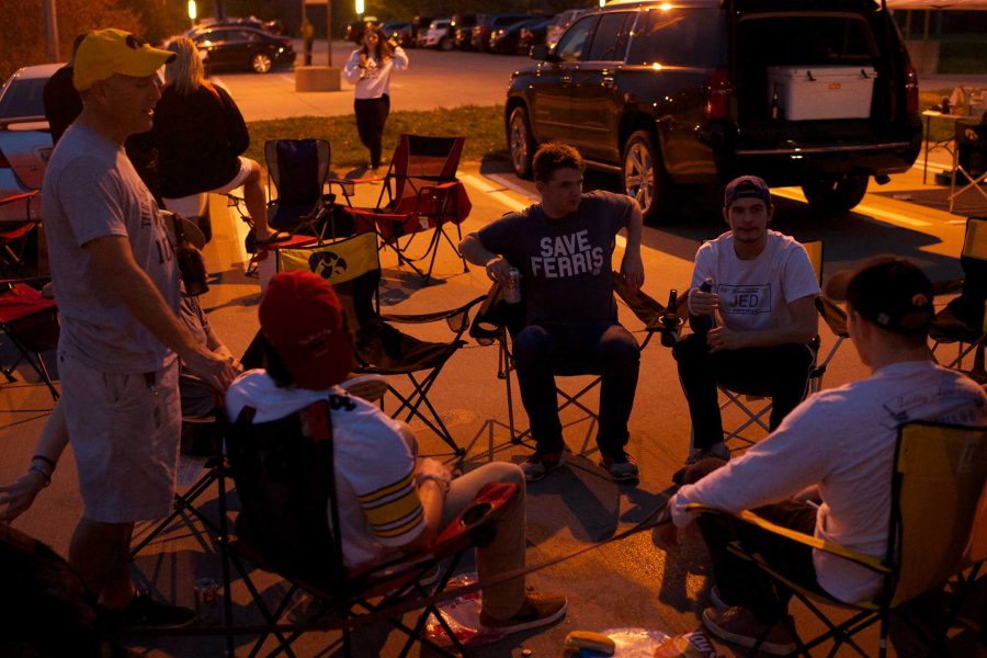 Students tailgate in the parking lot at the Iowa Soccer Complex in Iowa City on Saturday, October 21, 2017. The Hawkeyes fell to the Badgers 3-0 (Paxton Corey/The Daily Iowan)