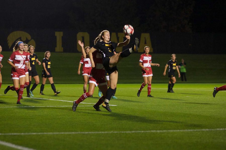 Hawkeye midfielder Morgan Kemerling attempts a half bicycle kick in the box at the Iowa Soccer Complex in Iowa City on Saturday, October 21, 2017. The Hawkeyes fell to the Badgers 3-0 (Paxton Corey/The Daily Iowan)