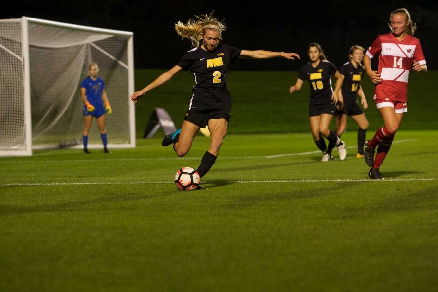 Iowa defender Laura Lainson clears the ball at the Iowa Soccer Complex in Iowa City on Saturday, October 21, 2017. The Hawkeyes fell to the Badgers 3-0 (Paxton Corey/The Daily Iowan)
