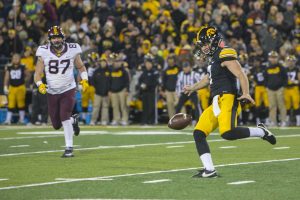 Iowas Colten Rastetter punts during the Iowa/Minnesota football game at Kinnick Stadium on Saturday, Oct. 28, 2017. The Hawkeyes defeated the Golden Gophers, 17-10, to keep the Floyd of Rosedale trophy. 