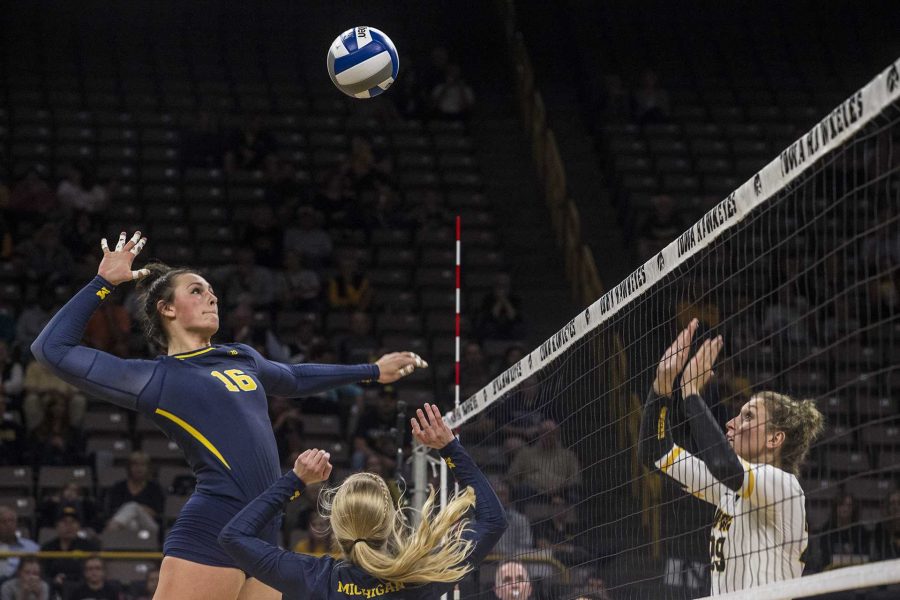 Michigans Cori Crocker spikes the ball during a match against Iowa at Carver-Hawkeye Arena on Wednesday, Oct. 4, 2017. Iowa defeated Michigan 3 sets to 1. (Nick Rohlman/The Daily Iowan)