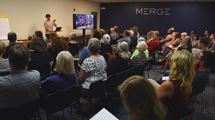People gather at Merge in Sept., 2017. (Paxton Corey/The Daily Iowan)