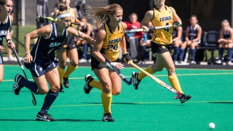 Iowas Sophie Sunderland chases after the ball during the Iowa-University of New Hampshire field hockey match on Sunday, Sept. 10, 2017. Iowa defeated UNH by a final score of 7-1. 
