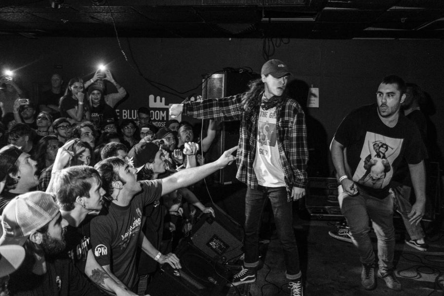 A concertgoer prepares to dive from the stage during a concert at Blue Moose on Saturday October 21, 2017. The show was headlined by the hardcore punk band Knocked Loose. (Nick Rohlman/The Daily Iowan)