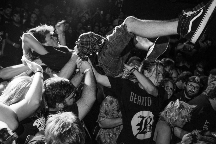 A fan crowd surfs during a concert headlined by Knocked Loose at Blue Moose on Saturday October 21, 2017. Knocked Loose is a hardcore punk band from Kentucky (Nick Rohlman/The Daily Iowan)