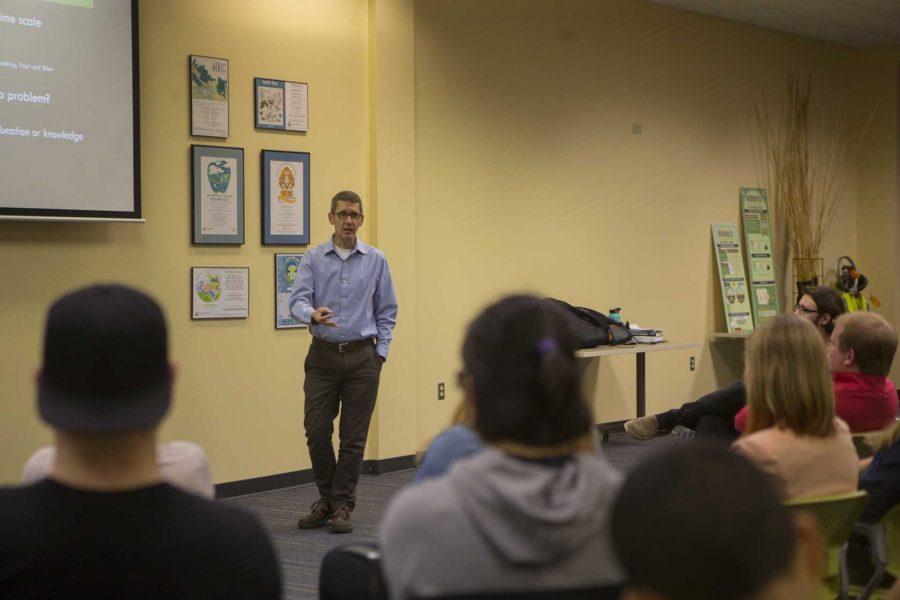 UI psychology professor Shaun Vecera speaks during How Psychology Can Change the Planet in the UI Office of Sustainability on Thursday, Oct. 19, 2017. The event was part of a month;y Sustainable Lecture series hosted by the UI Environmental Coalition. (Lily Smith/The Daily Iowan)