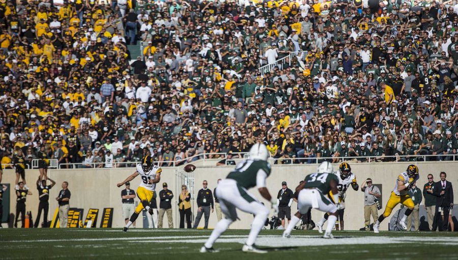 Iowa Kicker Miguel Recinons kicks off during the game between Iowa and Michigan State at Spartan Stadium on Saturday Sept. 30, 2017. The Spartans defeated the Hawkeyes 17-10. (Nick Rohlman/The Daily Iowan)