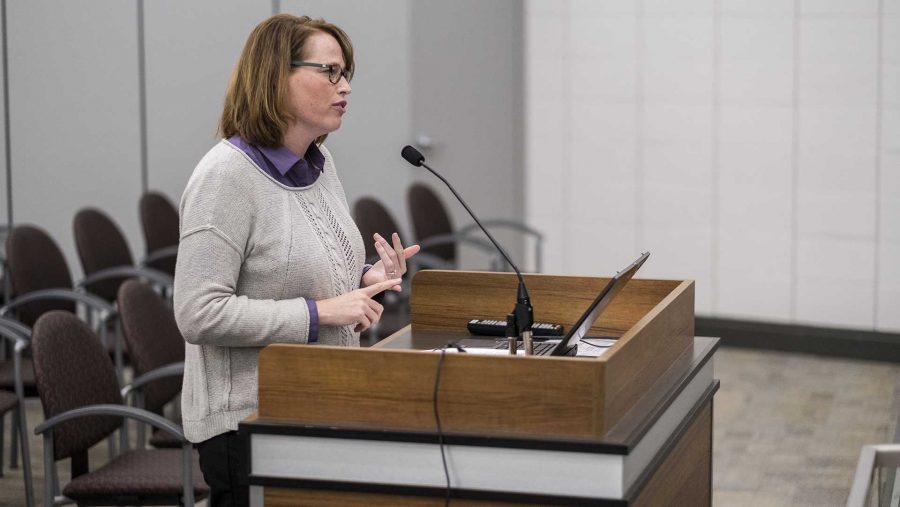 Tracy Hightshoe addresses the council regarding an application for a housing grant during a city council meeting on Tuesday, Oct. 17, 2017. (Nick Rohlman/The Daily Iowan)