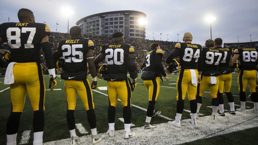 Iowa+players+stand+on+the+field+before+the+national+anthem+during+an+Iowa%2FMinnesota+football+game+in+Kinnick+Stadium+on+Saturday%2C+Oct.+28%2C+2017.+The+Hawkeyes+defeated+the+Golden+Gophers%2C+17-10.+%28Joseph+Cress%2FThe+Daily+Iowan%29