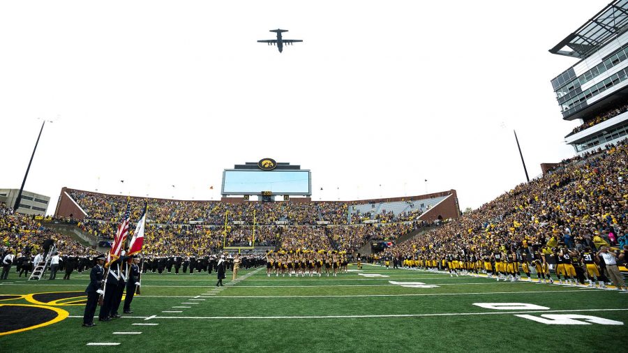 A+C-130+flies+over+Kinnick+Stadium+before+the+start+of+the+game+between+Iowa+and+Illinois+on+Saturday%2C+Oct.+7%2C+2017.+%28Dave+Harmantas%2FThe+Daily+Iowan%29