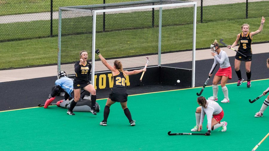 University of Iowa Hawkeyes field hockey players Maddy Murphy (left) Sophie Sunderland celebrate scoring a goal against the Ohio State Buckeyes on Sunday, 22 Oct., 2017. Murphy’s goal was the only one of the match and the Hawkeyes defeated the Buckeyes 1-0. (David Harmantas/The Daily Iowan)