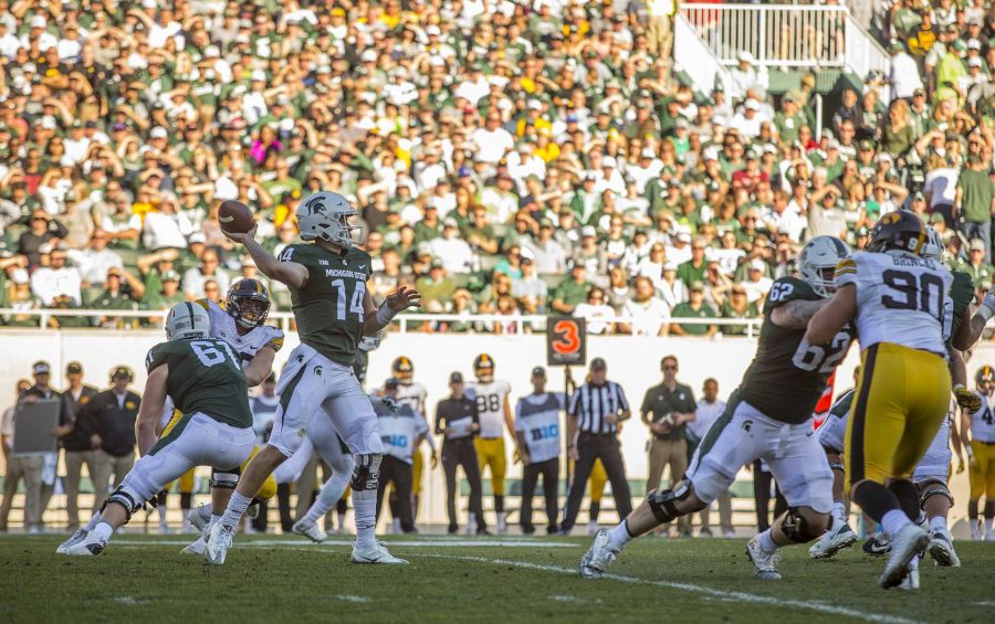 Michigan State quarterback Brian Lewerke throws a pass during the game between Iowa and Michigan State at Spartan Stadium on Saturday Sept. 30, 2017. The Spartans defeated the Hawkeyes 17-10. (Nick Rohlman/The Daily Iowan)