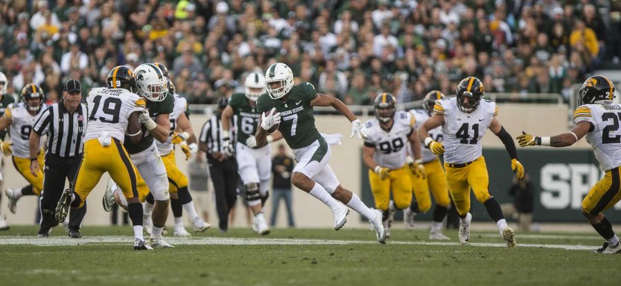 Spartans wide receiver Cody White runs with the ball during the game between Iowa and Michigan State at Spartan Stadium on Saturday Sept. 30, 2017. The Spartans defeated the Hawkeyes 17-10. (Nick Rohlman/The Daily Iowan)