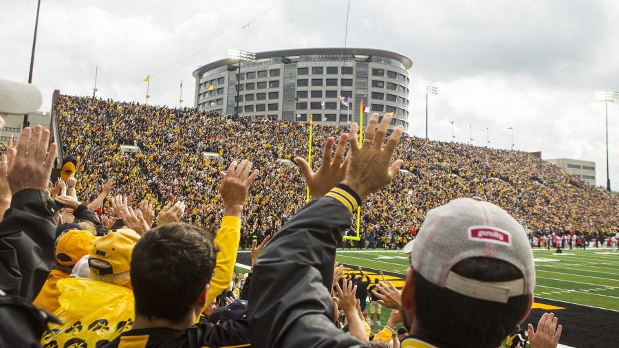 Iowa+fans+wave+to+children+in+the+Stead+Family+Childrens+Hospital+after+the+first+quarter+during+an+NCAA+football+game+between+Iowa+and+Illinois+in+Kinnick+Stadium+on+Saturday%2C+Oct.+7%2C+2017.++The+Hawkeyes+defeated+the+Fighting+Illini%2C+45-16.+%28Joseph+Cress%2FThe+Daily+Iowan%29