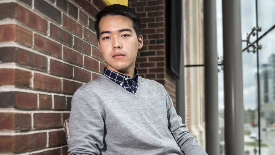 Austin Wu, brother of the late Sean Wu, sits in the second floor of the IMU on Monday. Austin Wu is involved in a kick-start campaign to raise money for his brother Sean, who passed away last year on campus. 