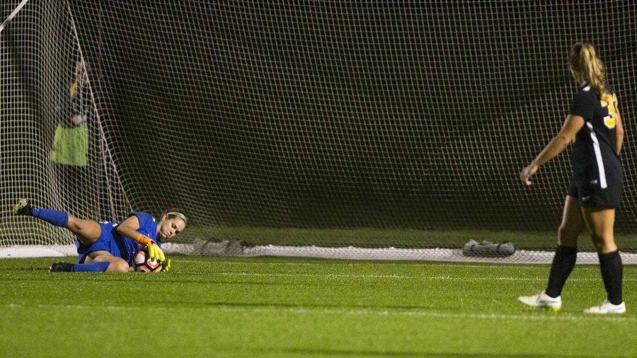 Iowa goalie Claire Graves makes a save during the Iowa/Nebraska womens soccer game at the UI Soccer Complex on Wednesday, Oct. 18, 2017. The Hawkeyes ended their game against the Cornhuskers in a 0-0 tie after two overtime periods. (Joseph Cress/The Daily Iowan)