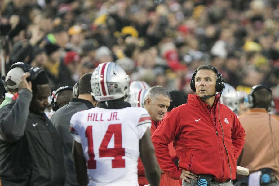 Ohio+State+head+coach+Urban+Meyer+looks+to+the+scoreboard+during+the+Iowa%2FOhio+State+football+game+in+Kinnick+Stadium+on+Saturday%2C+Nov.+4%2C+2017.+The+Hawkeyes+defeated+the+Buckeyes+in+a+storming+fashion%2C+55-24.+%28Joseph+Cress%2FThe+Daily+Iowan%29
