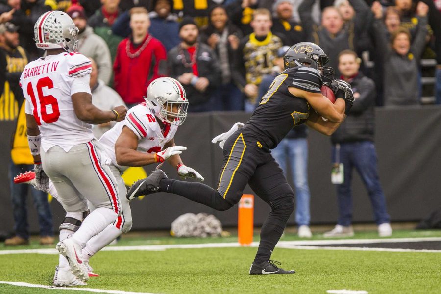 Iowa+strong+safety+Amani+Hooker+dives+into+the+end+zone+after+intercepting+a+pass+on+Ohio+States+first+play+from+scrimmage+during+Iowas+game+against+Ohio+State+at+Kinnick+Stadium+on+Saturday%2C+Nov.+4%2C+2017.+The+Hawkeyes+defeated+the+Buckeyes+55+to+24.+%28Nick+Rohlman%2FThe+Daily+Iowan%29