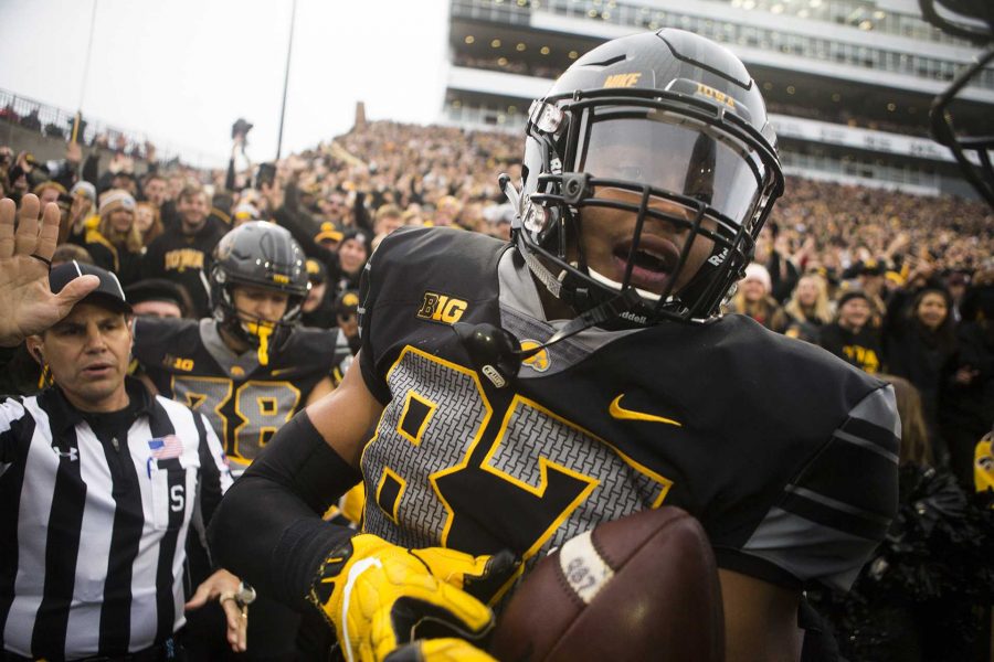 Iowa+tight+end+Noah+Fant+celebrates+with+teammates+after+scoring+a+touchdown+during+the+Iowa%2FOhio+State+football+game+in+Kinnick+Stadium+on+Saturday%2C+Nov.+4%2C+2017.+The+Hawkeyes+defeated+the+Buckeyes+in+a+storming+fashion%2C+55-24.+%28Joseph+Cress%2FThe+Daily+Iowan%29