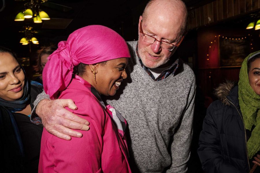 Mazahir Salih is congratulated by Mayor Jim Throgmorton after election results were announced at the Mill in Iowa City on Tuesday, Nov. 7, 2017. Salih won an at large seat on the Iowa City city council along with incumbent Kingsley Botchway. (Nick Rohlman/The Daily Iowan)