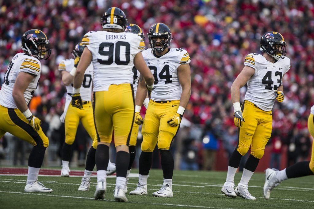 Iowa+defensive+end+A.J.+Epenesa+%2894%29+celebrates+a+sack+during+the+game+between+Iowa+and+Wisconsin+at+Camp+Randall+Stadium+on+Saturday%2C+Nov.+11%2C+2017.+The+Hawkeyes+fell+to+the+Badgers+38-14.+%28Ben+Smith%2FThe+Daily+Iowan%29