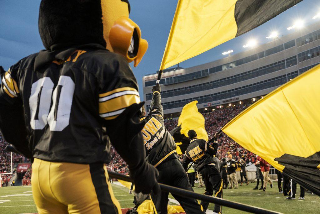 Herky and the spirit squad wave flags during Iowa's game against Wisconsin at Camp Randall Stadium on Saturday, Nov. 11, 2017. The badgers defeated the Hawkeyes 38-14. (Nick Rohlman/The Daily Iowan)