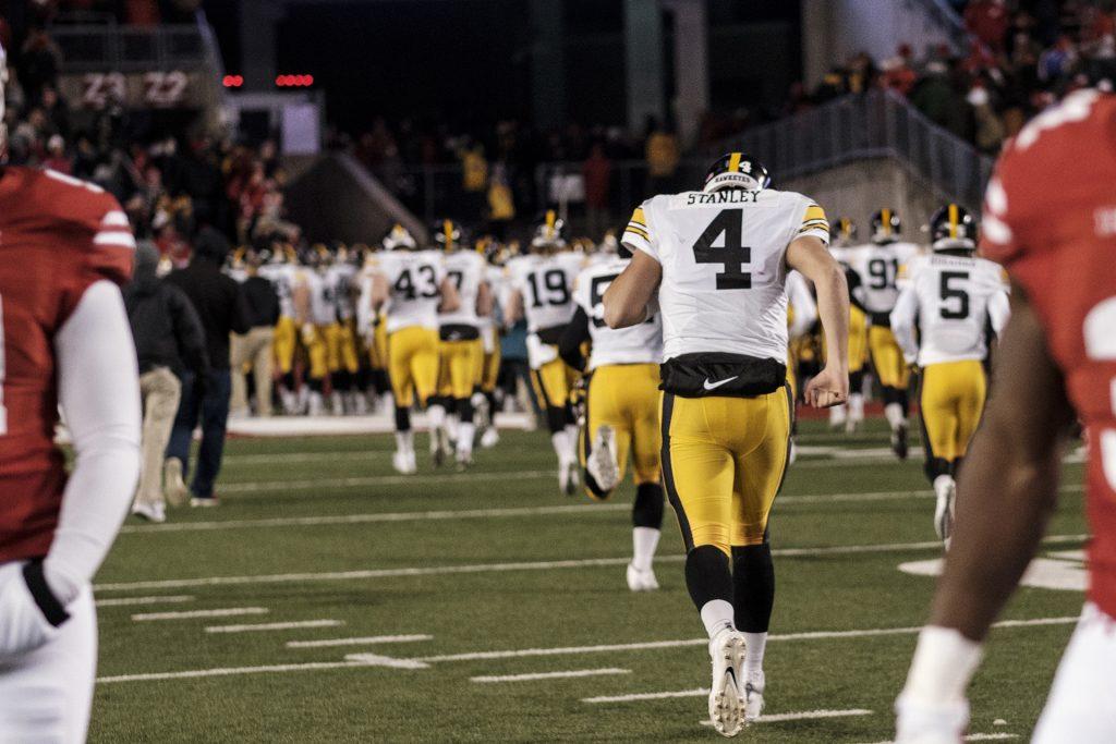 Iowa quarterback Nate Stanley runs towards the locker room after Iowa's game against Wisconsin at Camp Randall Stadium on Saturday, Nov. 11, 2017. The badgers defeated the Hawkeyes 38-14. (Nick Rohlman/The Daily Iowan)