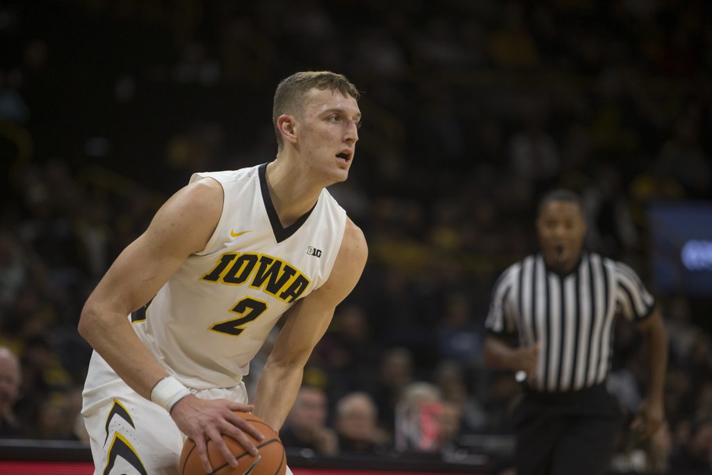 Iowa forward Jack Nunge prepares to pass during a basketball match between Iowa and Grambling State on Thursday, November 16, 2017. The Hawkeyes defeated the Tigers, 85-74. (Shivansh Ahuja/The Daily Iowan)