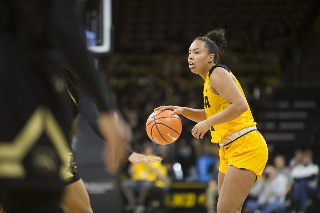 Iowa guard Alexis Sevillian dribbles during the Iowa/Western Michigan womens basketball game in Carver-Hawkeye Arena on Sunday, Nov. 19, 2017. The Hawkeyes defeated the Broncos, 79-56. (Joseph Cress/The Daily Iowan)