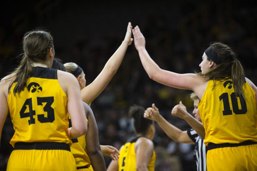 Iowa+center+Megan+Gustafson+and+Carly+Mohns+high-five+during+the+Iowa%2FWestern+Michigan+womens+basketball+game+in+Carver-Hawkeye+Arena+on+Sunday%2C+Nov.+19%2C+2017.+The+Hawkeyes+defeated+the+Broncos%2C+79-56.+%28Joseph+Cress%2FThe+Daily+Iowan%29