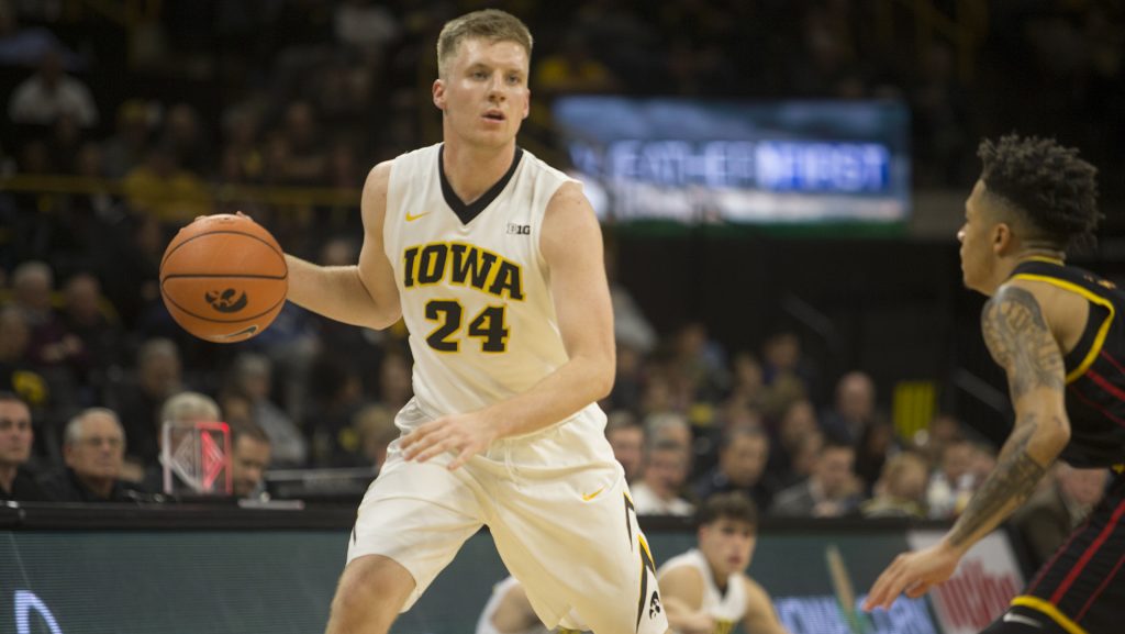 Iowa+guard+Brady+Ellingson+dribbles+through+the+defense+during+a+basketball+match+between+Iowa+and+Grambling+State+on+Thursday%2C+Nov.+16%2C+2017.+The+Hawkeyes+defeated+the+Tigers%2C+85-74.+%28Shivansh+Ahuja%2FThe+Daily+Iowan%29