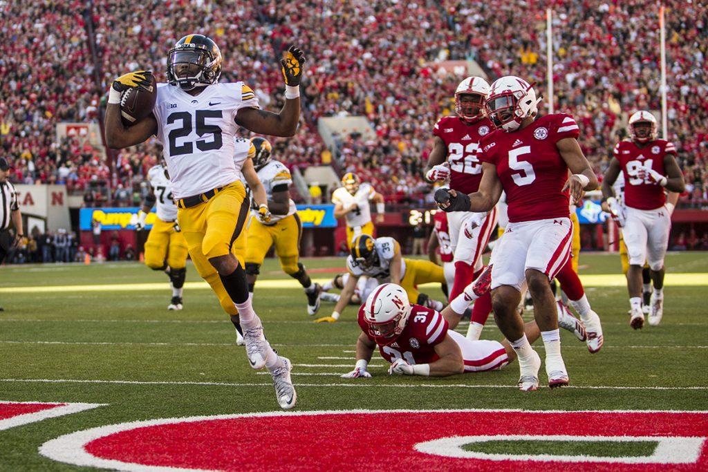 Iowa running back Akrum Wadley scores a touchdown during Iowas game against Nebraska at Memorial Stadium on Nov. 24th. The Hawkeyes defeated the Cornhuskers 56-14. (Nick Rohlman/The Daily Iowan)