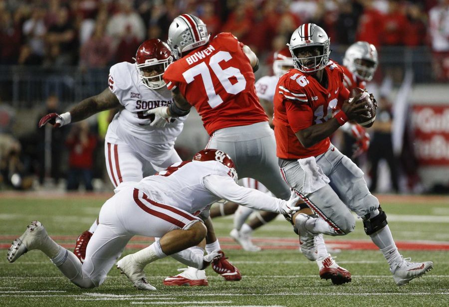 Ohio State quarterback J.T. Barrett (16) scrambles under pressure during the third quarter against Oklahoma at Ohio Stadium in Columbus, Ohio, on Saturday, Sept. 9, 2017. (Joshua A. Bickel/Columbus Dispatch/TNS)