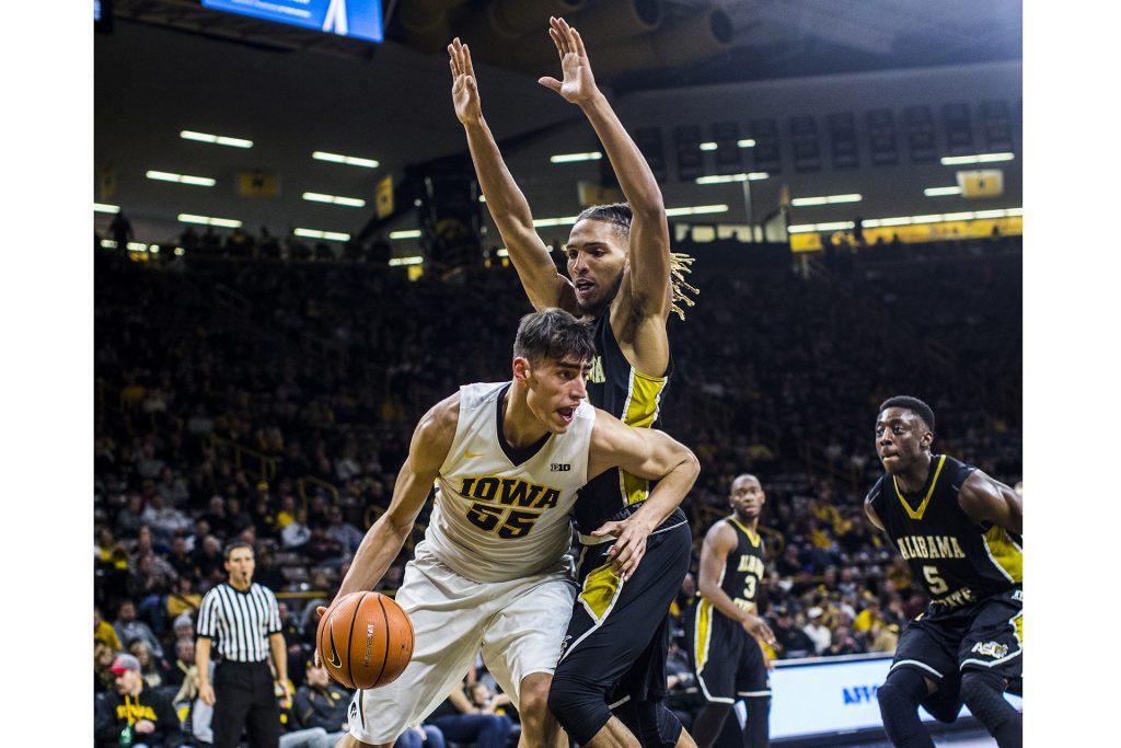 Iowa+forward+Luka+Garza+dribbles+on+the+baseline+under+a+Alabama+State+defender+during+a+mens+basketball+game+in+Carver-Hawkeye+Arena+on+Sunday%2C+Nov.+12%2C+2017.+The+Hawkeyes+defeated+the+Hornets%2C+92-58.+%28Nick+Rohlman%2FThe+Daily+Iowan%29