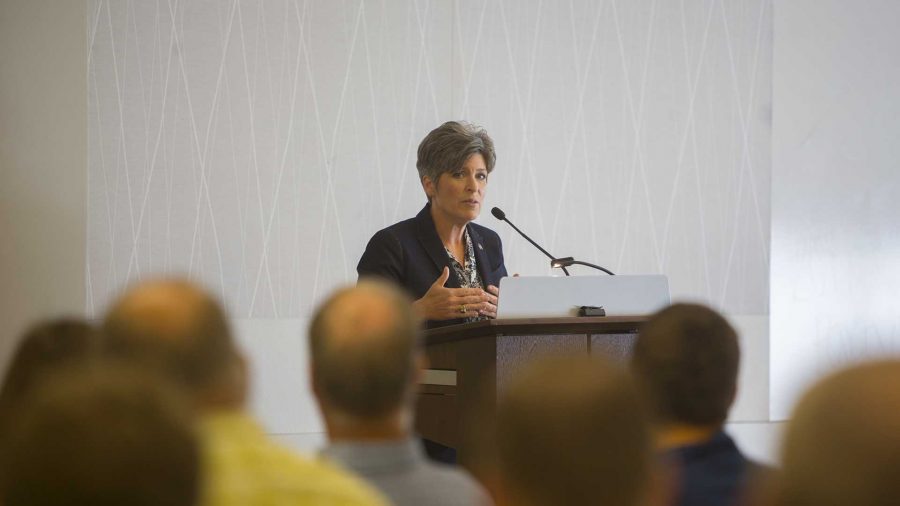 Senator Joni Ernst (R-IA) speaks during a US Service Academy Open House in the Cedar Rapids Public Library on Saturday, June 24, 2017. Sen. Ernst met with prospective military families and protesters alike to answer questions both on and off par with the event. (Lily Smith/The Daily Iowan)