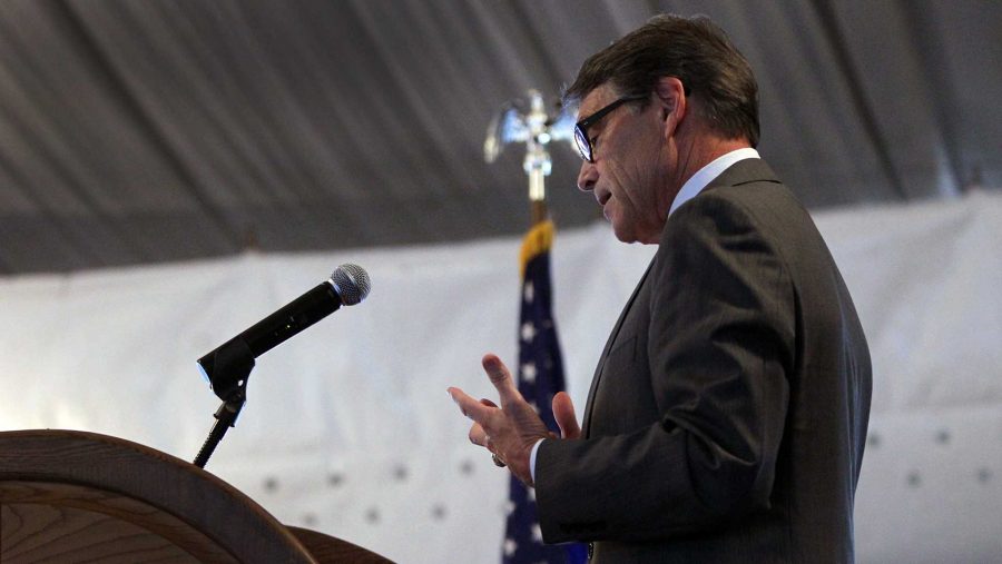 Former Texas Gov. Rick Perry announces the suspension of his presidential campaign at the Eagle Council national convention on Friday, Sept. 11, 2015, at the Marriott St. Louis Airport. (Robert Cohen/St. Louis Post-Dispatch/TNS)