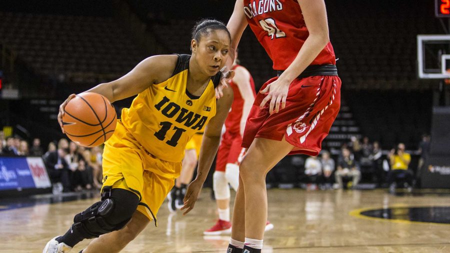 Iowa+guard+Tania+Davis+%2811%29+drives+the+ball+against+Minnesota+State-Moorheads+Drew+Sannes+during+the+womens+basketball+game+between+Iowa+and+Minnesota+State+at+Carver-Hawkeye+Arena+on+Sunday%2C+Nov.+5%2C+2017.+The+Hawkeyes+beat+the+Dragons+85-56.+%28Ben+Smith%2FThe+Daily+Iowan%29