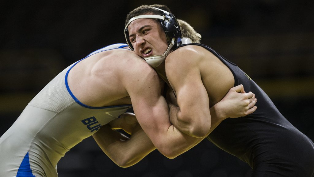 Iowas+No.+2+ranked+Michael+Kemerer+%28157+lbs.%29+competes+against+Buffalos+Alex+Leone+during+the+Iowa+City+Duals+wrestling+match+at+Carver-Hawkeye+Arena+on+Friday%2C+Nov.+17%2C+2017.+The+Hawkeyes+defeated+Iowa+Central+48-0%2C+Buffalo+33-6%2C+and+North+Dakota+State+38-6.+%28Ben+Smith%2FThe+Daily+Iowan%29