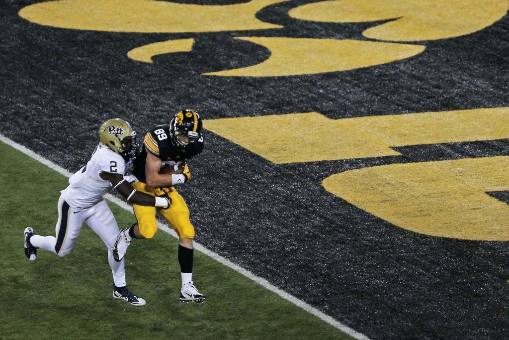 Iowa Hawkeyes wide receiver Matt VandeBerg (89) catches the ball while defended by Pittsburgh Panthers defensive back Terrish Webb (2) in Kinnick Stadium on Saturday, Sept. 19, 2015. The Hawkeyes beat the Panthers, 27-24. (The Daily Iowan/Joshua Housing)