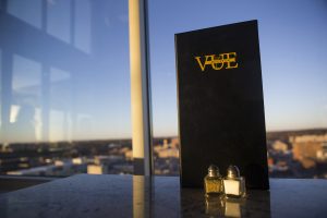 A menu for the Vue rooftop bar is seen during a ribbon cutting event for the Hilton Garden Inn on Clinton Street on Thursday, Nov. 30, 2017. 