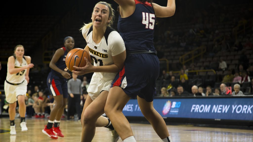 Iowa forward Hannah Stewart drives to the hoop during the Iowa/Samford basketball game at Carver-Hawkeye Arena on Sunday, Dec. 3, 2017. The Hawkeyes defeated the Bulldogs, 80-59. (Lily Smith/The Daily Iowan)
