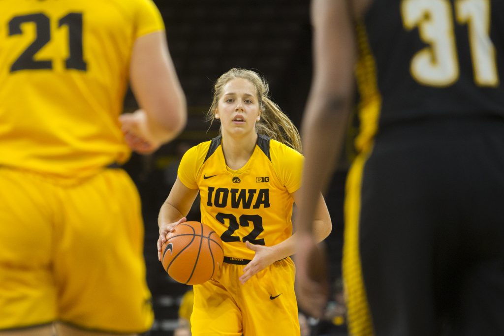 Iowa guard Kathleen Doyle dribbles the ball during the Iowa/Arkansas-Pine Bluff basketball game in Carver-Hawkeye Arena on Saturday, Dec. 9, 2017. The Hawkeyes defeated the Golden Lions, 85-45. (Lily Smith/The Daily Iowan)