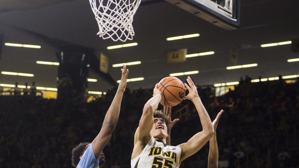 Iowas+Luka+Garza+%2855%29+drives+the+ball+for+a+layup+during+the+game+between+Iowa+and+Southern+at+Carver-Hawkeye+Arena+on+Sunday%2C+Dec.+10.+%28Ben+Allan+Smith%2FThe+Daily+Iowan%29