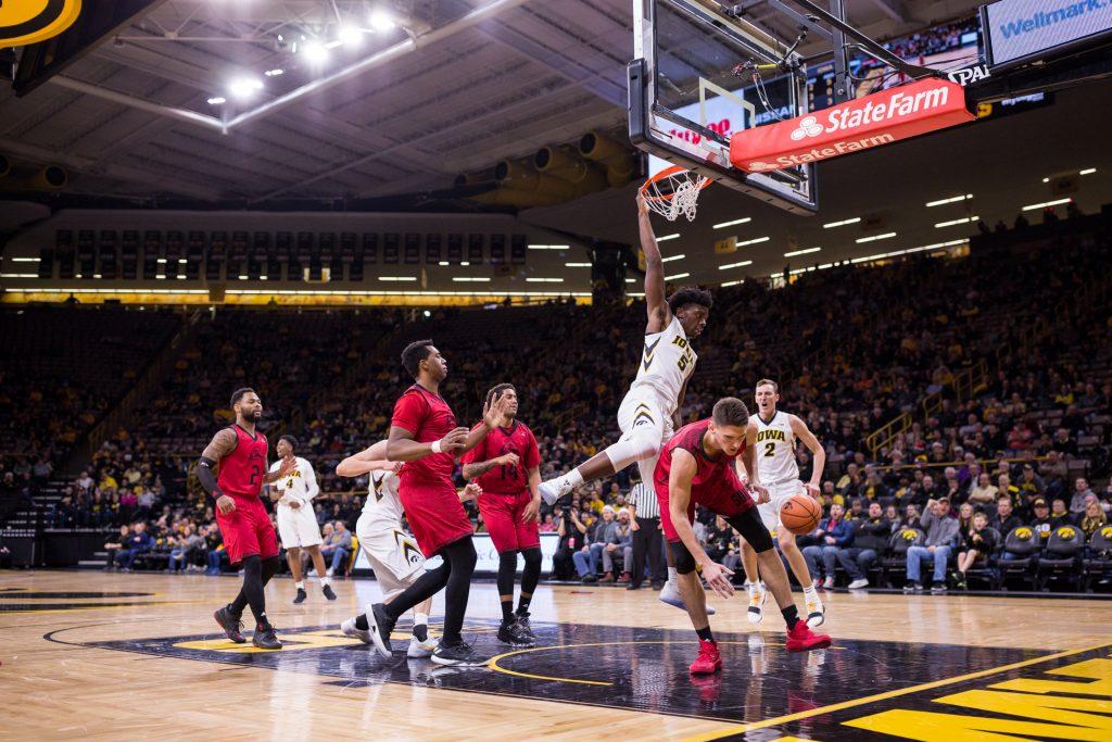 Iowa forward Tyler Cook slams down a dunk against Southern Utah University during the first half of a basketball game at Carver-Hawkeye Arena on Tuesday, Dec. 19, 2017. The Hawkeyes defeated the Thunderbirds 92-64. (David Harmantas/The Daily Iowan)