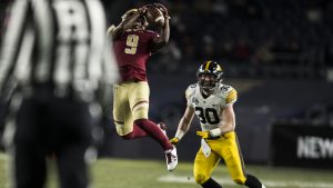 Boston College wide receiver Kobay White (9) catches the ball over Iowas Jake Gervase (30) during the first half of the New Era Pinstripe Bowl at Yankee Stadium in New York on Wednesday, Dec. 27. 