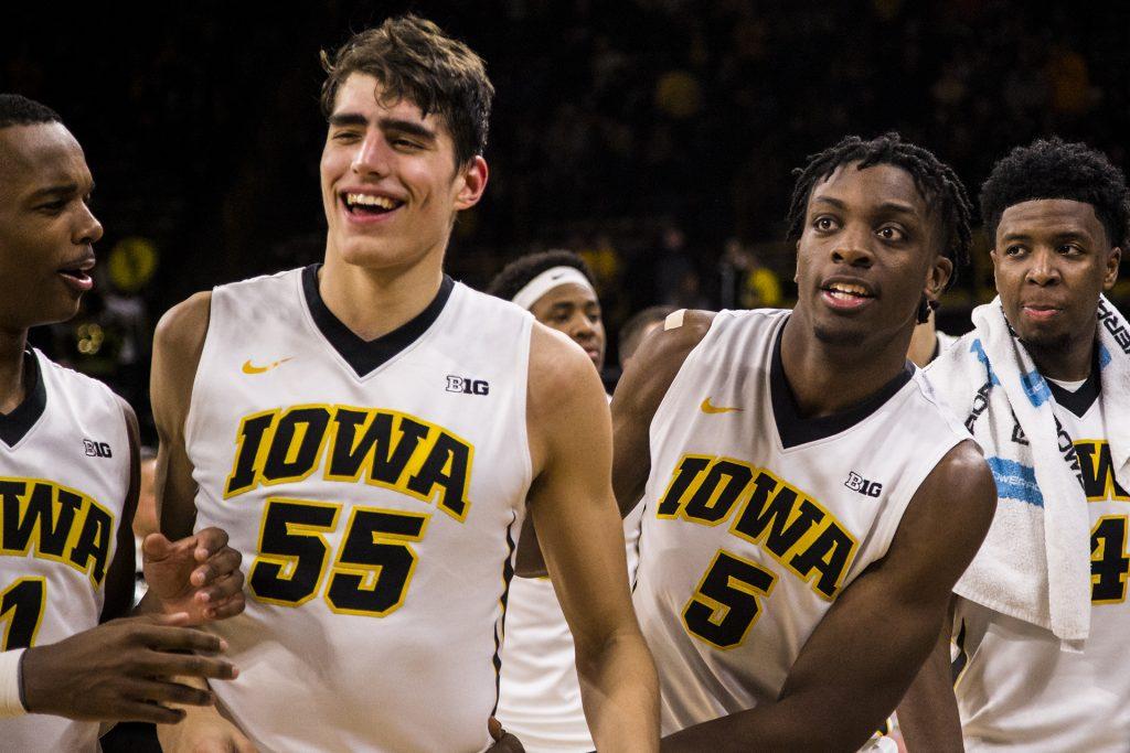 Iowa+players+celebrate+after+Iowas+game+against+Northern+Illinois+on+Friday+Dec.+29%2C+2017.+The+Hawkeyes+defeated+the+Huskies+98-75.+%28Nick+Rohlman%2FThe+Daily+Iowan%29
