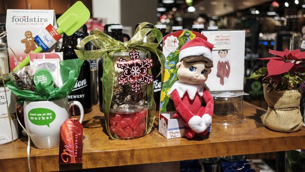Fresco the elf is seen at Bread Garden in Iowa City on Monday, Dec. 4, 2017. The Iowa City Downtown District has organized an elf scavenger hunt at downtown businesses. (Nick Rohlman/The Daily Iowan)