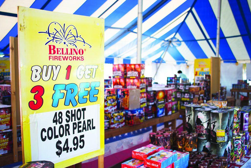Fireworks+are+seen+inside+a+Bellino+Fireworks+tent+in+the+parking+lot+of+the+1st+Avenue+Hy-Vee+in+Iowa+City+on+Tuesday%2C+June+27%2C+2017.+State+law+says+consumer+fireworks+may+be+sold+and+used+in+permitted+areas+and+many+be+purchased+by+customers+18+or+older.+Iowa+City+Code+says+fireworks+many+not+be+used+in+city+limits+with+an+exception+for+novelty+fireworks%2C+such+as+sparklers+and+snakes.+%28Joseph+Cress%2FThe+Daily+Iowan%29