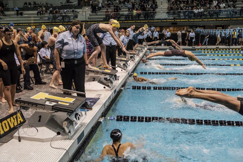 Swimmers compete during day three of the USA Swimming West Junior Nationals in Iowa City on Saturday, Dec. 9, 2017. (Nick Rohlman/The Daily Iowan)