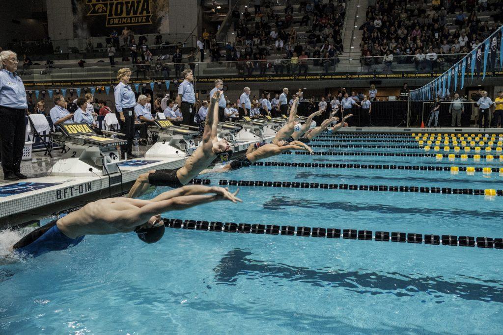 Swimmers compete during day three of the USA Swimming West Junior Nationals in Iowa City on Saturday, Dec. 9, 2017. (Nick Rohlman/The Daily Iowan)